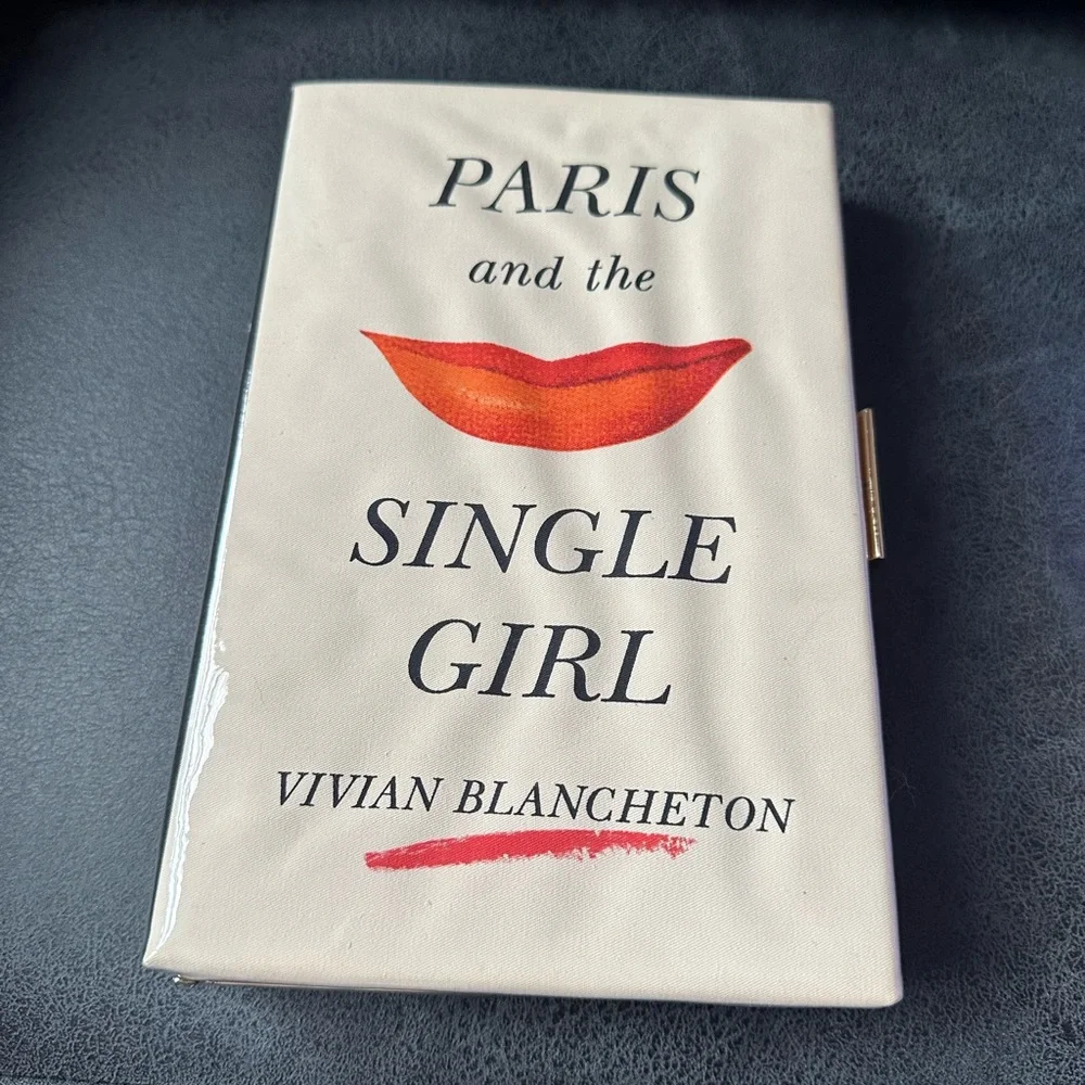 Kate spade paris and the single girl book clutch
